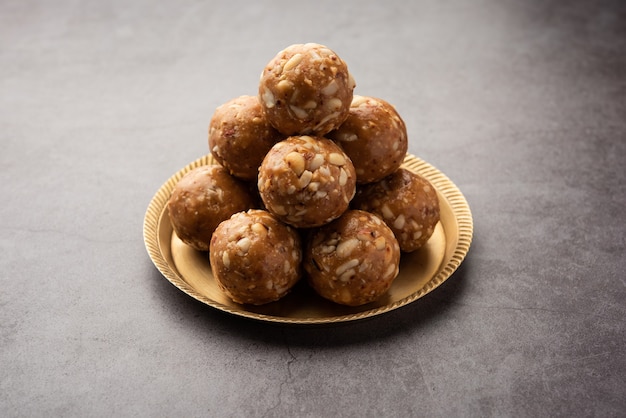 Indian sweet groundnut ladoo or mungfali or peanut laddo or laddu made using roasted peanuts and jaggery