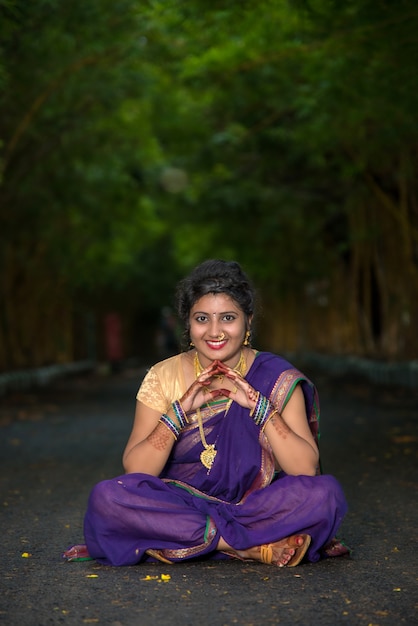 80+ Sitting Beautiful Young Woman Posing In A Sari Dress Stock Photos,  Pictures & Royalty-Free Images - iStock