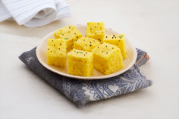 Indian Traditional Street Food Khaman Dhokla Served With Chutney & Chilli