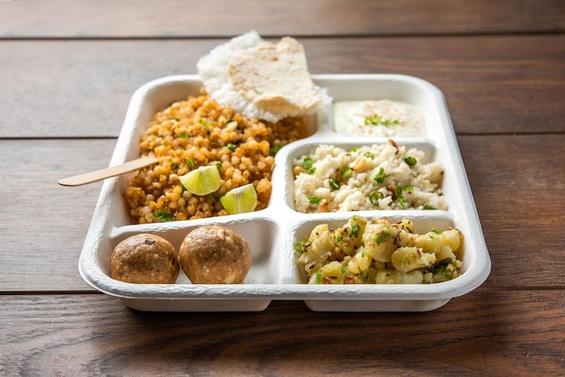 Indian Upwas thali fasting food platter or thali for home delivery or takeaway parcel for any Vrat