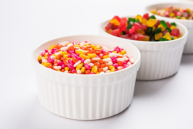 Indian variety of traditional mouth freshener in white ceramic bowls, selective focus