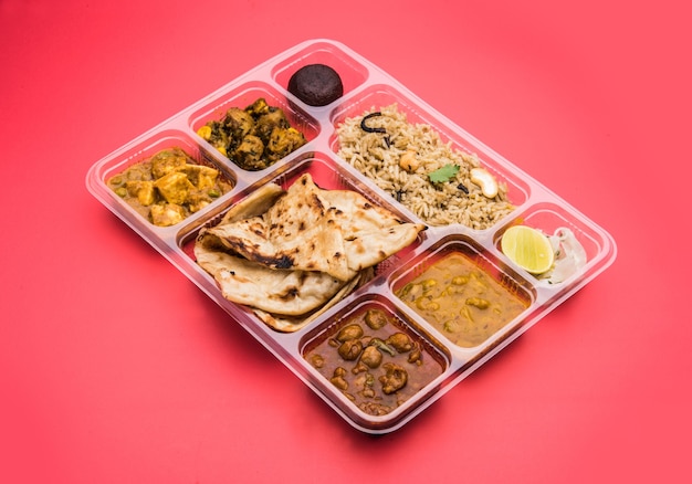 Indian vegetarian thali or food platter for parcel or for home delivery