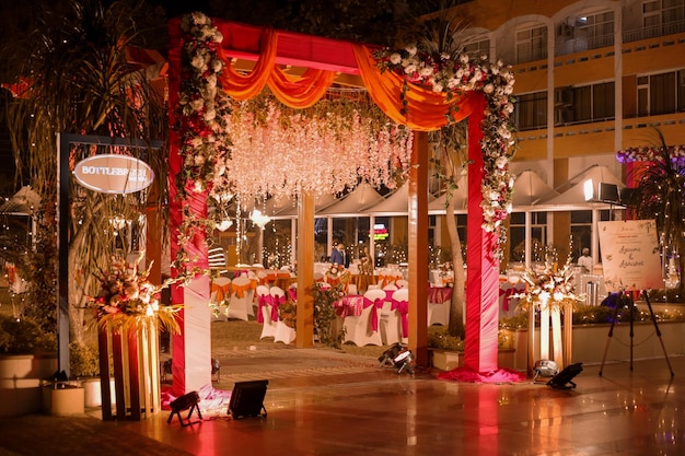 indian wedding gate decoration. green eucalyptus background