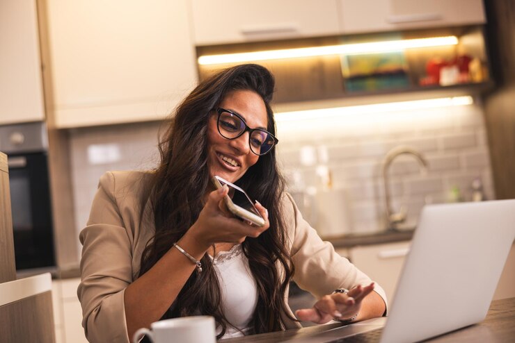 Photo indian woman send voice mail and working