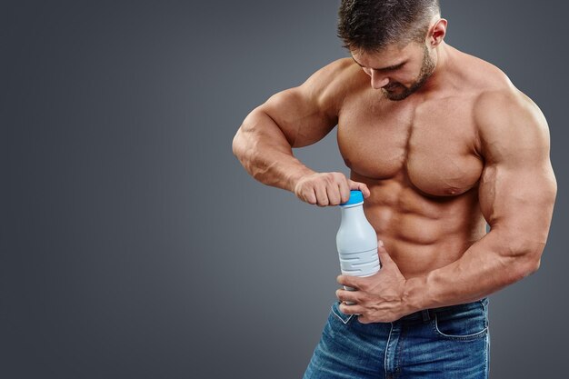 Indian young fitness man posing to the camera