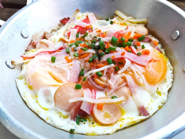 Indochina pan-fried egg with toppings Thai style, Vietnamese Omelette