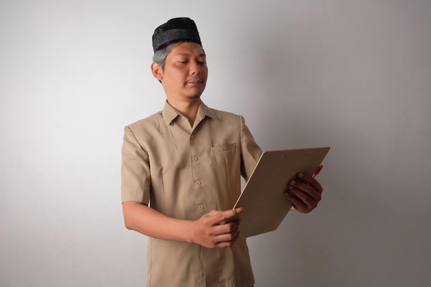 Indonesian civil worker with clipboard