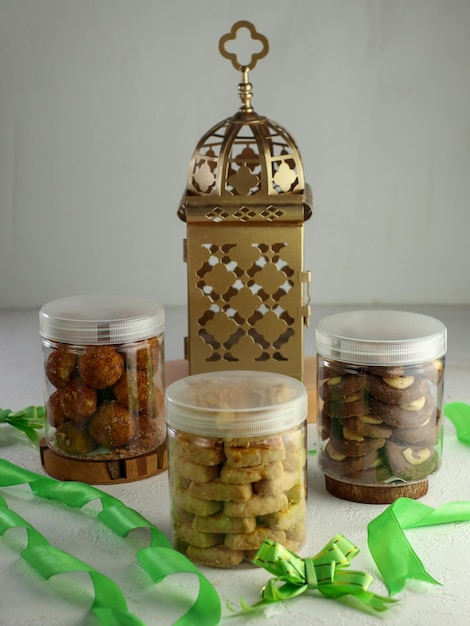 Indonesian famous cake for celebrate Ied Mubarak, famous cookies in a jar with a pink clear backgrou