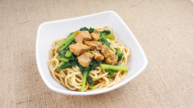 Indonesian food mie ayam noodles with chicken Served in bowl Selective focus