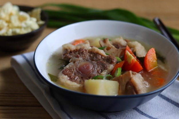 Indonesian Oxtail Soup or Sop Buntut made from beef tail