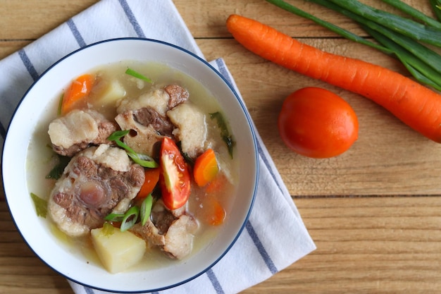 Indonesian Oxtail Soup or Sop Buntut made from beef tail