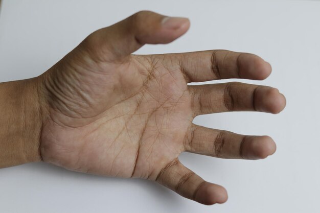 Indonesian peopl fingers on a white background