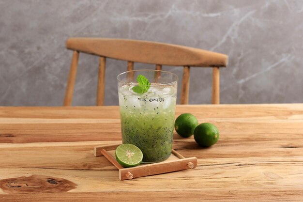 Indonesian Vegetarian Drink Es Timun Serut made from Shredded Cucumber, Lime Juice, and Basil Seeds