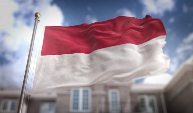 Indonesië Vlag 3D-rendering op de blauwe hemel gebouw achtergrond
