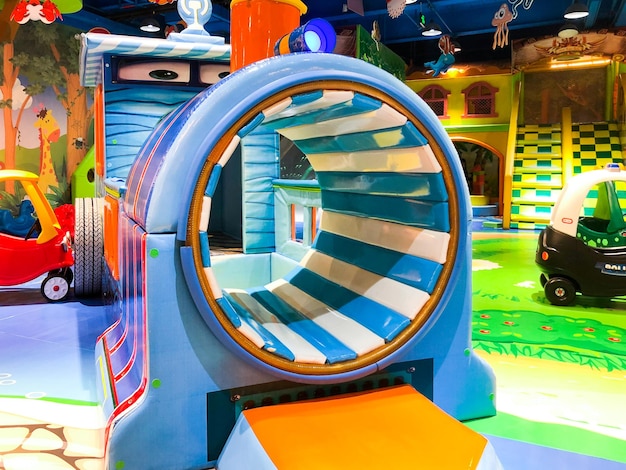 Indoor modern colorful children playground Inside kids playground with slides Kids entertainment