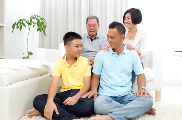 Indoor portrait of beautiful asian 3 generations family