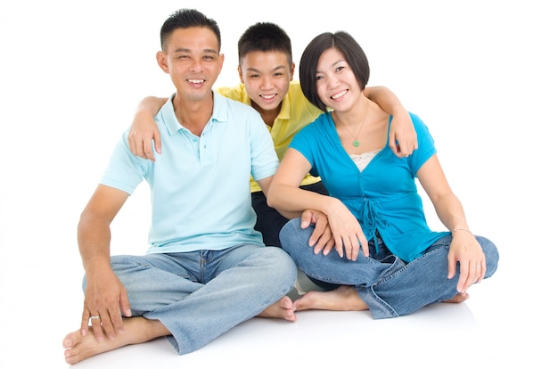 Indoor portrait of beautiful asian family