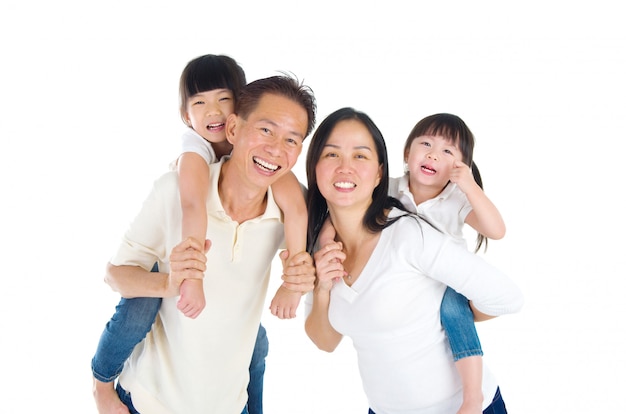 Indoor portrait of beautiful asian family