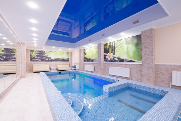 Indoor swimming pool in hotel spa center