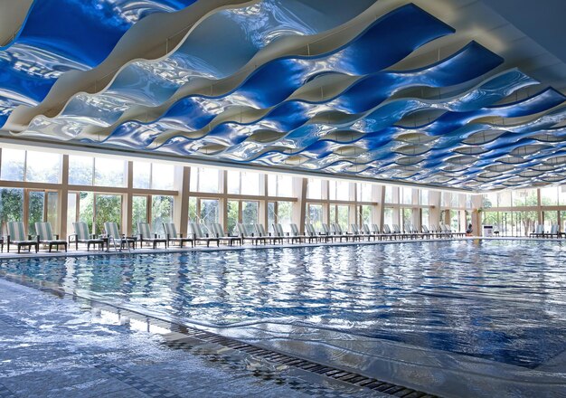 Indoor swimming pool in modern hotel