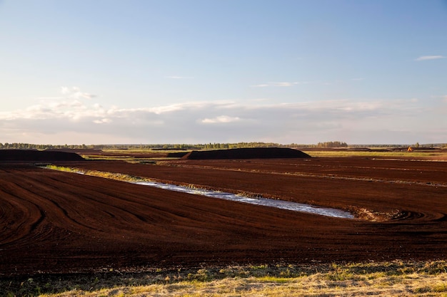 Industrial area where black peat is mined