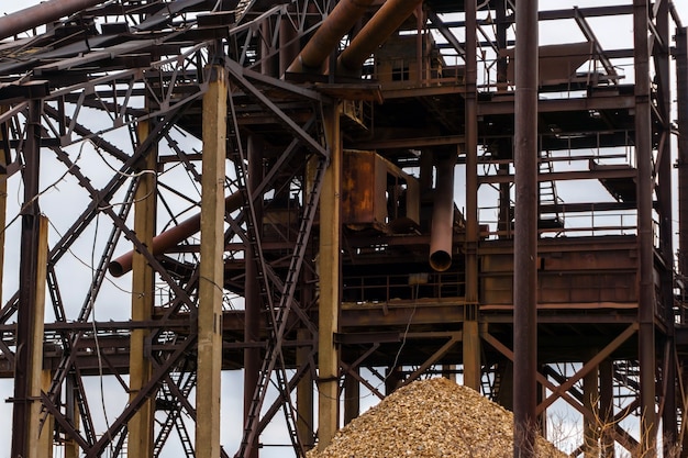 Industrial background with rusty metal structures - old stationary separator of sand and gravel