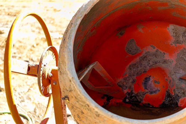 Industrial concrete mixer at a construction site Mixing concrete and mortar on site Construction equipment