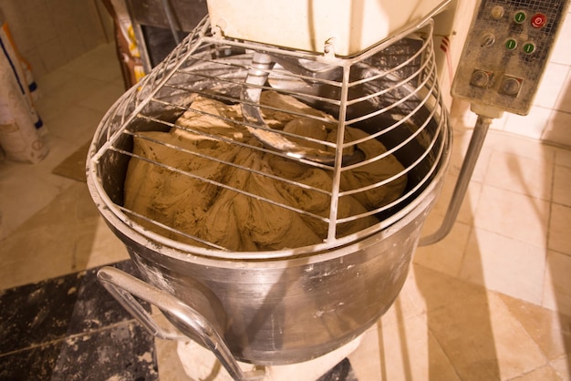 Industrial dough mixing machine in bread factory