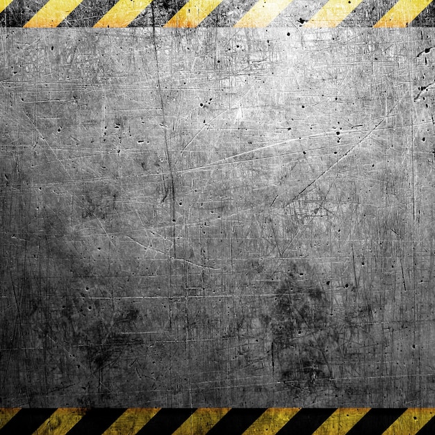 Industrial grungy steel plate with black and yellow strip