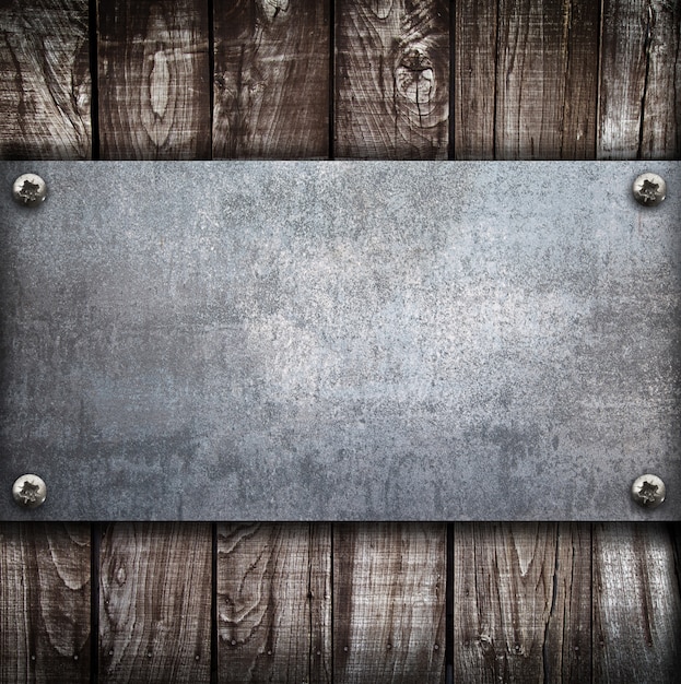 Industrial metal plate on wood