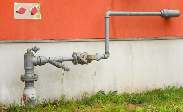 Industrial pipes in urban setting conveying connectivity and infrastructure concept