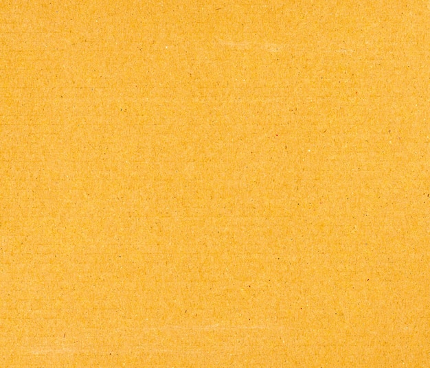インダストリアルスタイルの茶色の波紋紙板の質感の背景