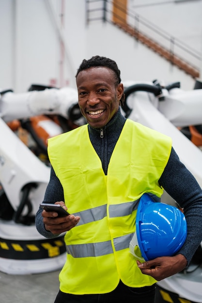 Industry worker using smartphone during his break