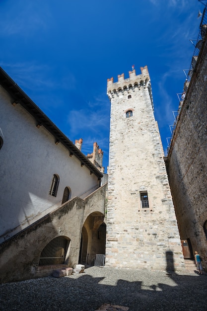 Ineror court of medieval castle Scaliger in old town Sirmione on lake Lago di Garda, Northern Italy