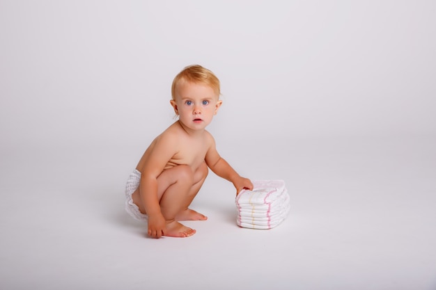 Photo infant child baby toddler sitting crawling backwards happy smiling on white
