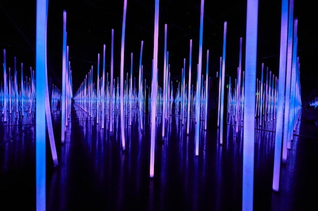 Infinity mirror room with blue led light poles