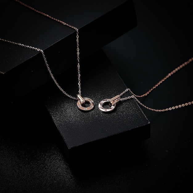 infinity necklace on black background