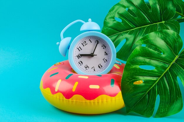Inflatable donut on blue background