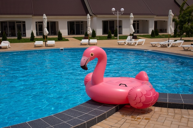 Inflatable flamingo near pool