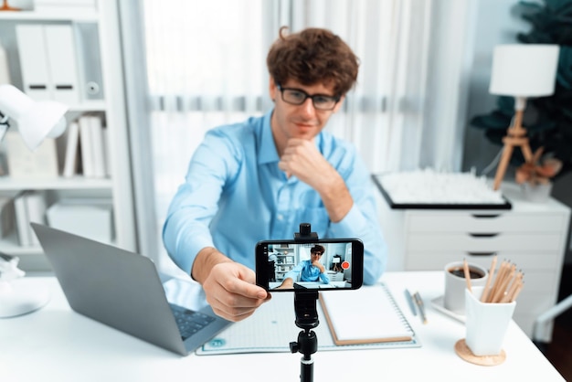 influencer setting smartphone blurred image focusing face recording gusher