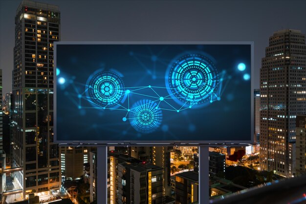 Information flow hologram on road billboard night panorama city view of Bangkok The largest technological center in Southeast Asia The concept of programming science