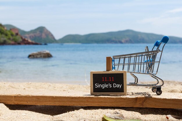 Photo information sign on beach against sky