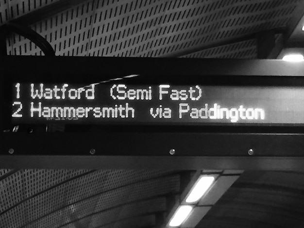 Photo information sign at railroad station platform