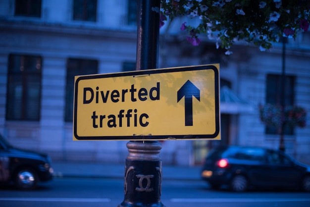 Photo information sign on road in city