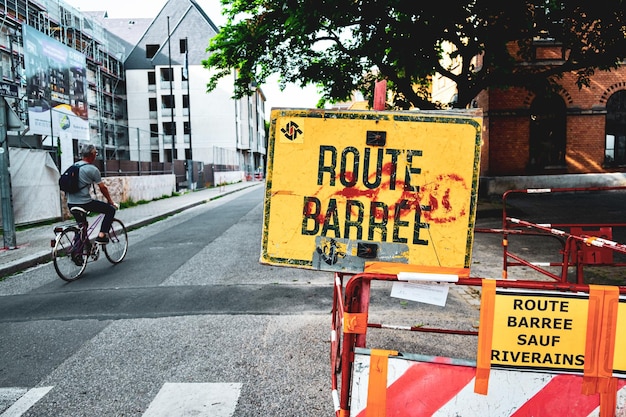 Photo information sign on road in city