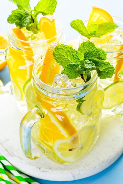 Infused water with fresh citrus fruits and ice.