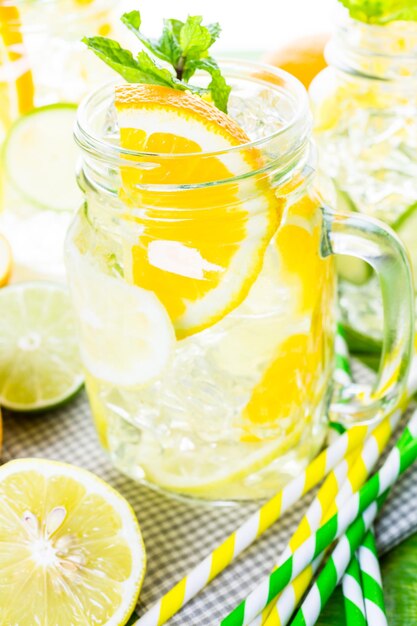 Infused water with fresh citrus fruits and ice.