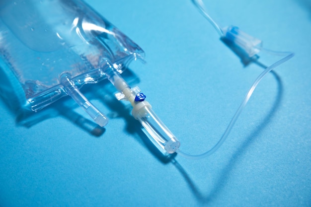 Infusion bag in the blue background IV drip chamber