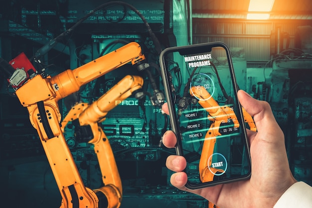 Ingenieur bestuurt robotarmen door augmented reality-industrietechnologie