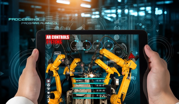 Ingenieur bestuurt robotarmen door augmented reality-industrietechnologie